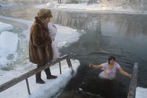 Russian woman swimming in winter