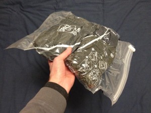 Winter travel gear in a compression bag